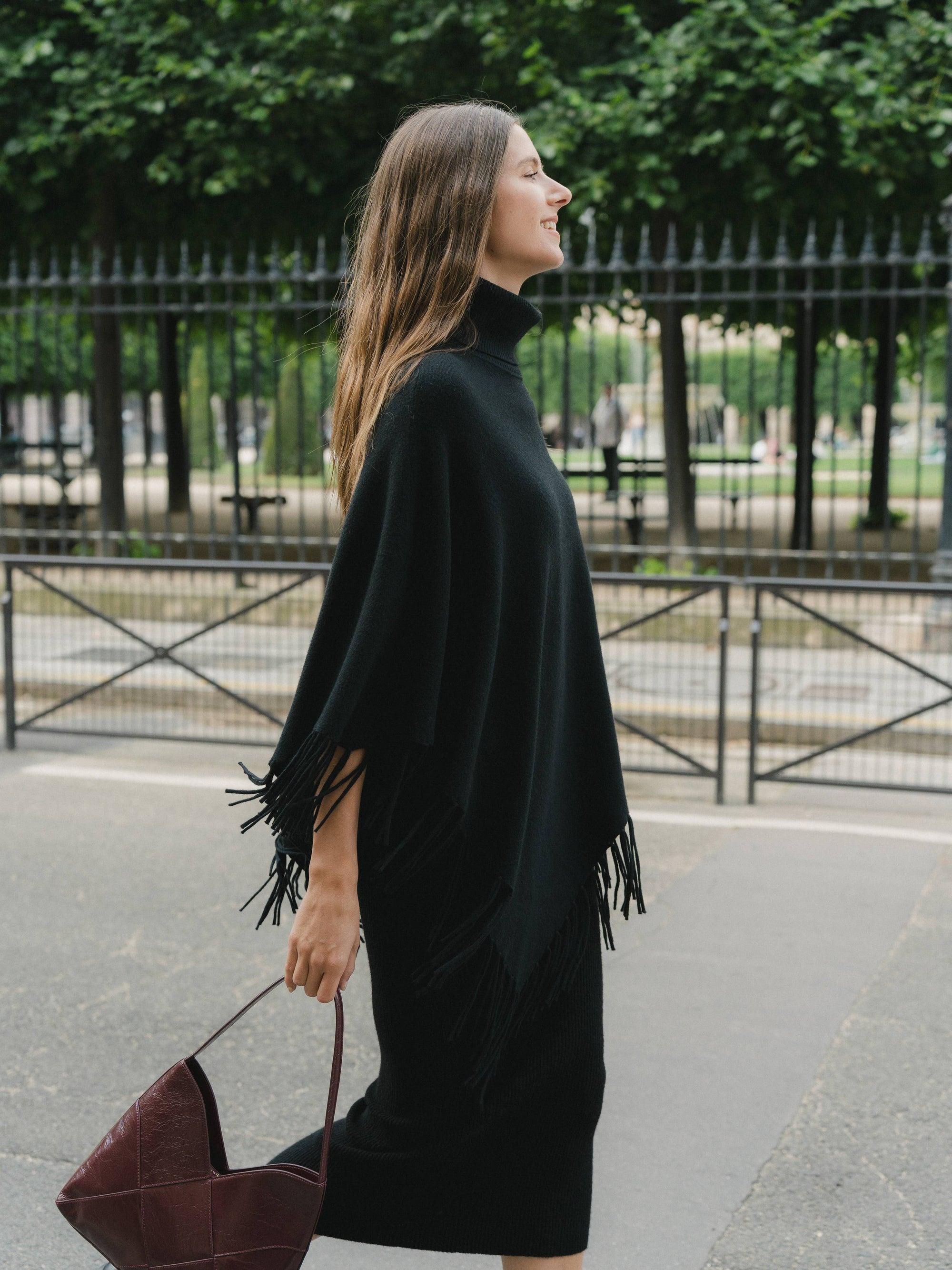Knit poncho with fringes