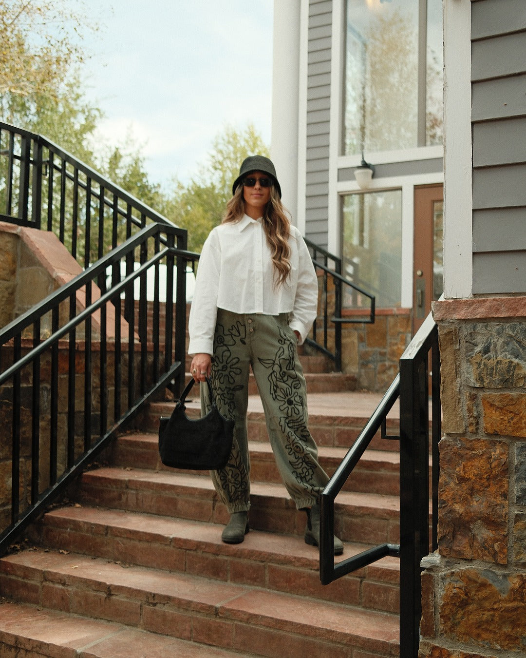 Floral embroidered pattern solid twill pants